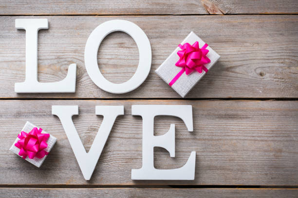 istock Valentines day holiday letters text message love card background 921038882