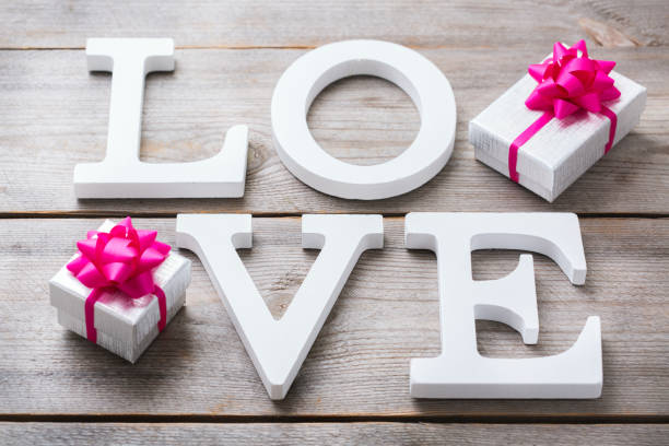 istock Valentines day holiday letters text message love card background 921038910