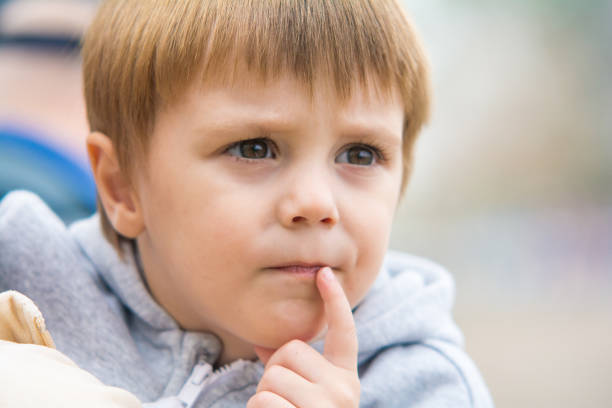 istock The boy poses in nature 921038950