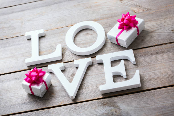istock Valentines day holiday letters text message love card background 921038960