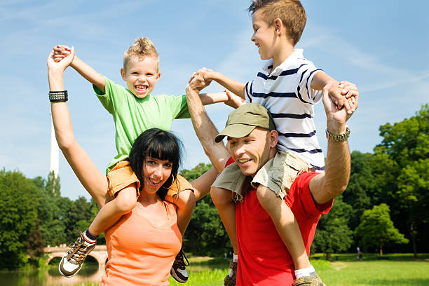 istock Piggyback in the park 92103921
