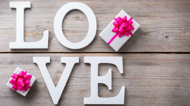 istock Valentines day holiday letters text message love card background 921042590