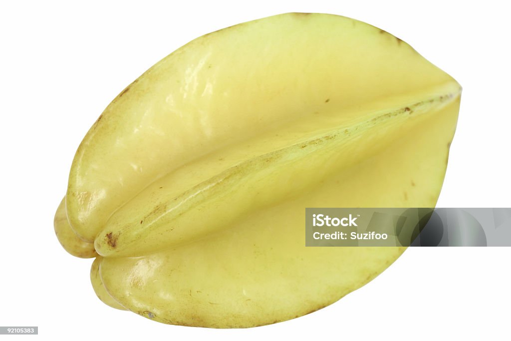 carom A carambola, or star fruit, isolated on white. Close-up Stock Photo