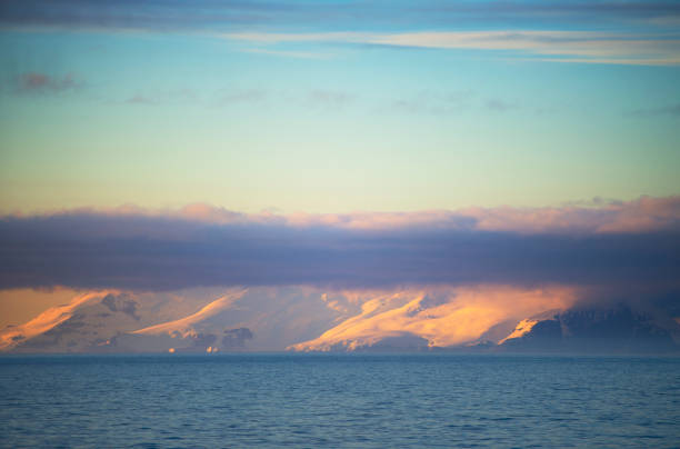 istock The sunset in the Antarctic glacier 921058532