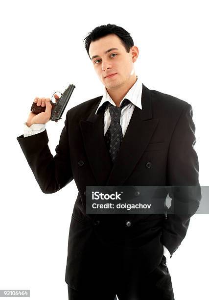 Uomo Con Una Pistola - Fotografie stock e altre immagini di Businessman - Businessman, Pistola, Sfondo bianco