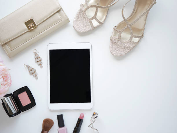istock Flat lay woman accessories, elegant items withe cosmetic and mobile phone. isolated. 921070200