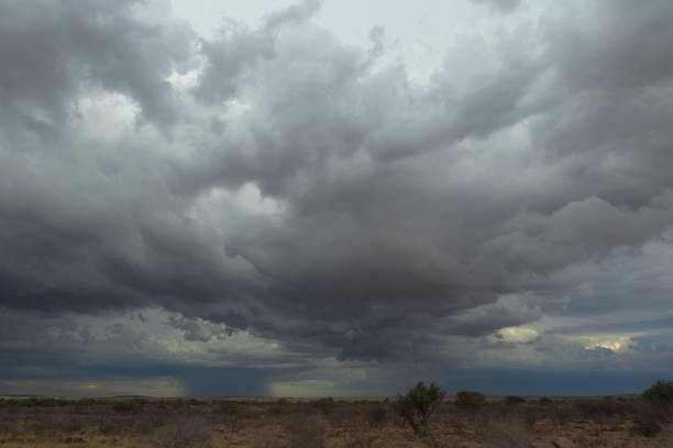 istock Namibian desert storm, extremely dramatic sky. 921070760
