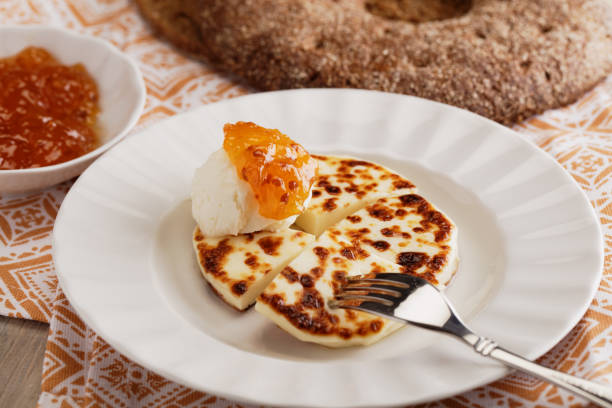 istock Cheese, cloudberry jam, and whipped  cream 921078028
