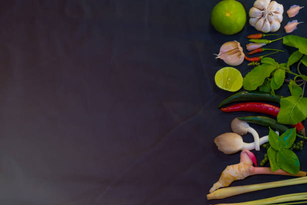 basil leaf,lime leaf,coriander leaves,coriander,mushroom,diet,table,vegetarian,tomato,onion,leaf,tom yum soup,tomyam,chilli,lemon grass,thai,curry,paste,background,food,cuisine,fresh,ingredient,herbs,