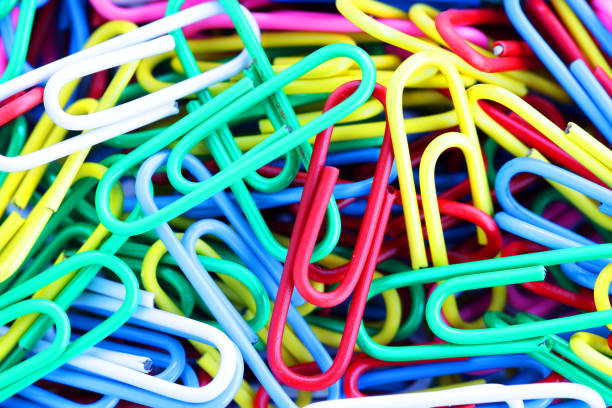 istock close up of colorful paper clips background 921086574