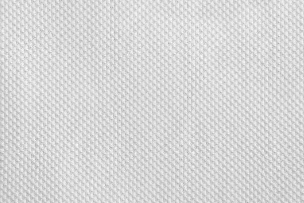 istock Texture of cool polyester fabric. Background of white textile 921104376