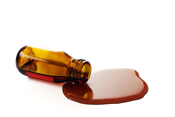 Cough Syrup Bottle Isolated Over a White Background. stock photo
