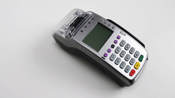 istock Card machine for paying with credit card. Pos terminal - modern technology for shopping and banking. White background 921109398