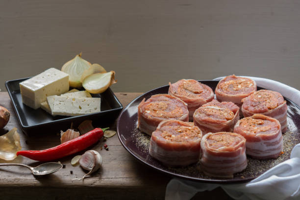 istock raw pork tenderloin filled with chorizo and wrapped with bacon 921122072