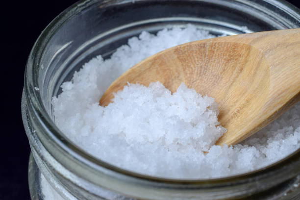 istock sea salt with wooden spoon 921150170