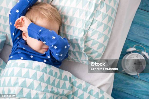 One Year Old Baby Crying Stock Photo - Download Image Now - Child, Sleeping, Bed - Furniture