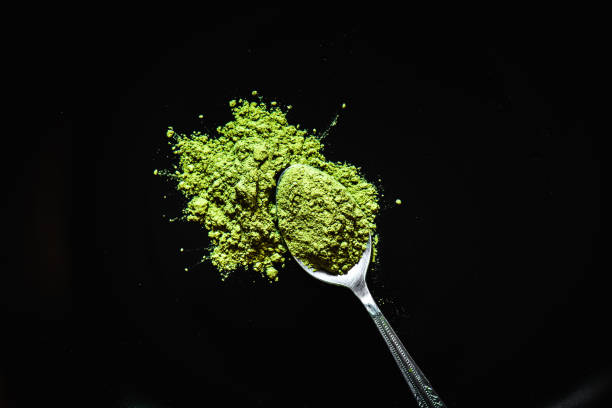 istock Matcha green tea on  black background 921157758
