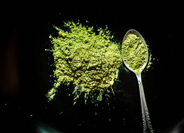 istock Matcha green tea on  black background 921158294