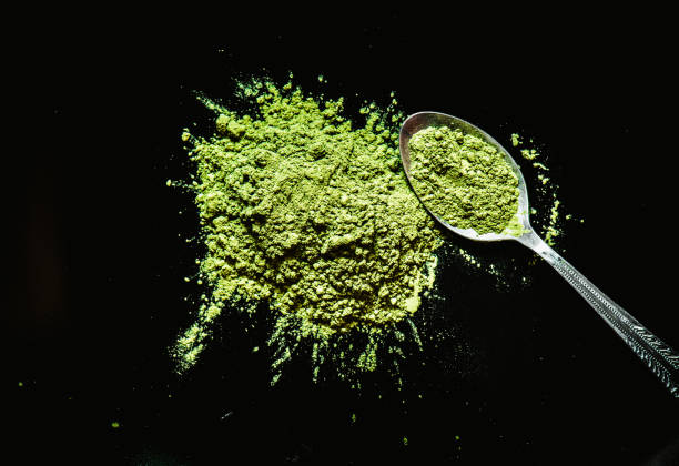 istock Matcha green tea on  black background 921158506