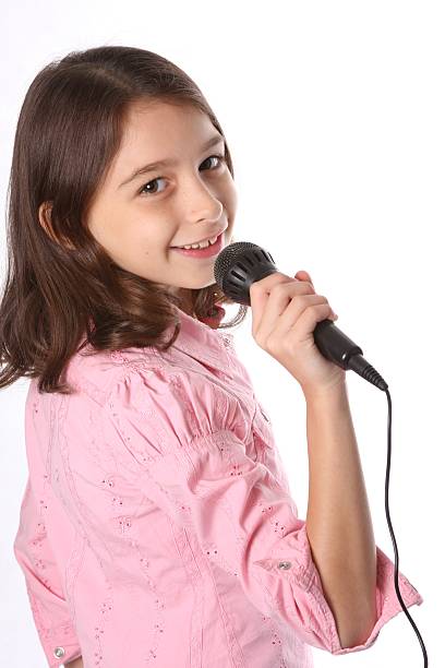 istock Young Girl / Child Singing in Microphone 92119669