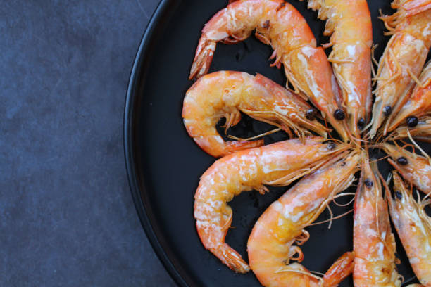 istock Spanish fried prawns shrimps, unpeeled 921198884