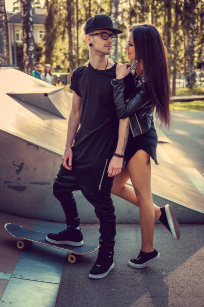 istock Tattooed skater and his girlfriend 921200312