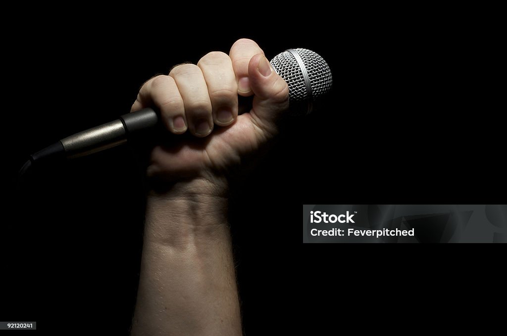 Microphone in Fist  Abstract Stock Photo