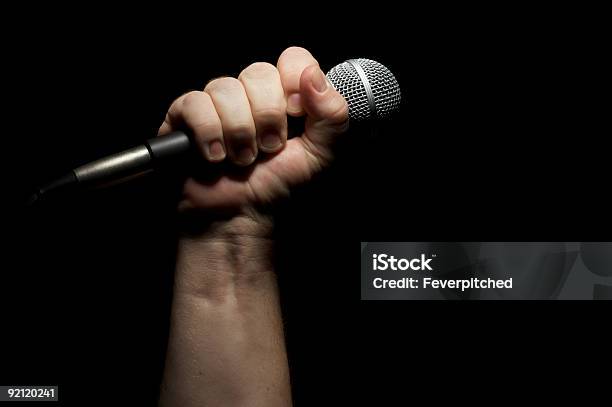 Microphone In Fist Stock Photo - Download Image Now - Abstract, Adult, Adults Only