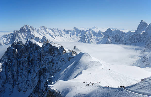 istock Snow slope with mountain-skiers, the Alps 92120301