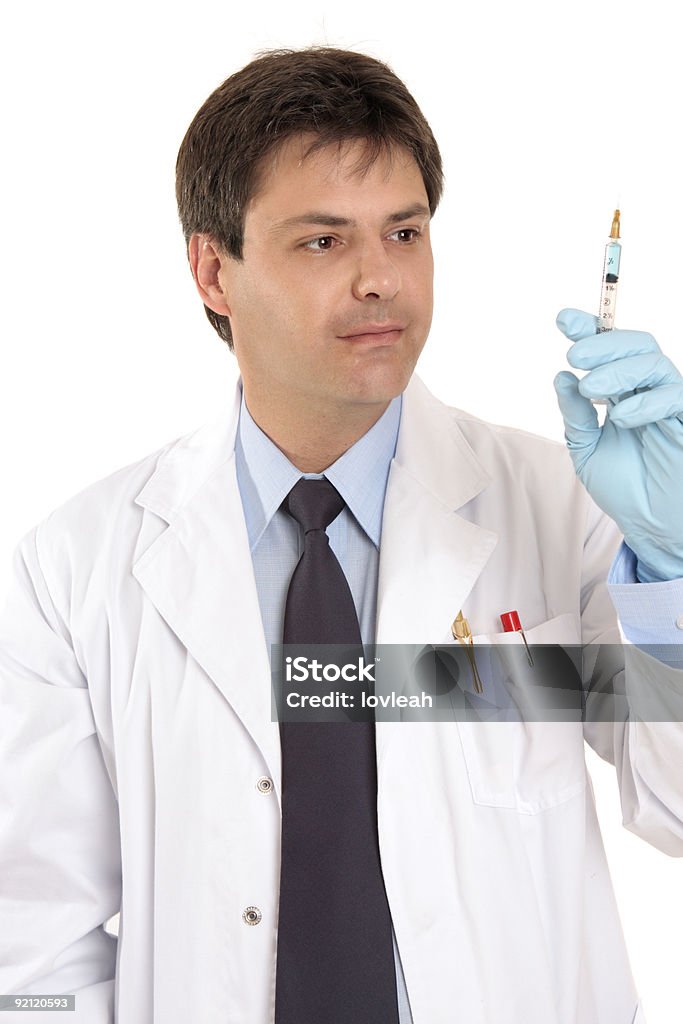 Medical practitioner with syringe needle  Adult Stock Photo