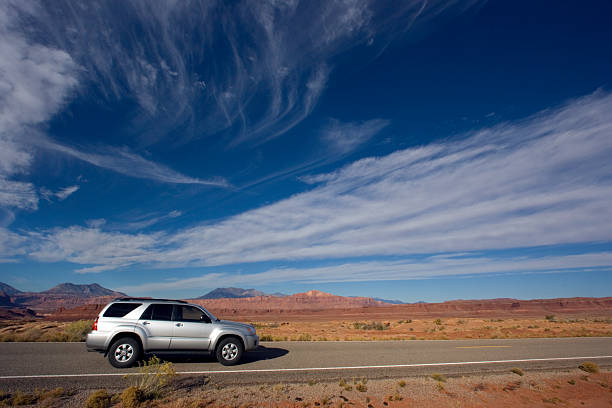Silver SUV driving in Utah.
