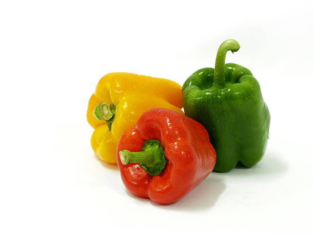 Red, Green and Yellow Capsicums stock photo