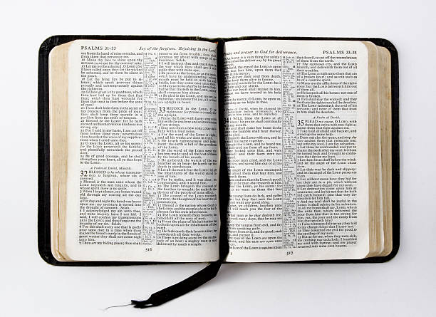 Black Bible open to the book of Psalms stock photo