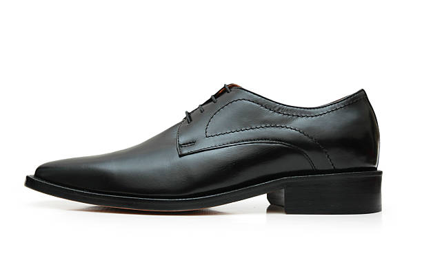 istock Black male shoe isolated on the white 92122048