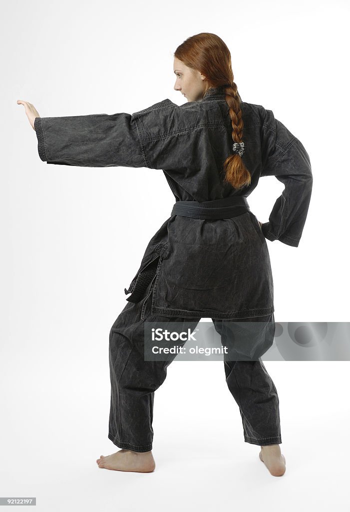 Girl barefooted en contra de posición, Vista posterior - Foto de stock de Color negro libre de derechos