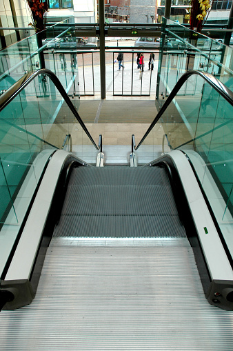 In the mall, escalator