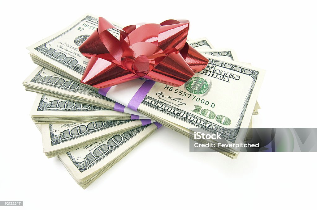 Stack of Hundred Dollar Bills with Bow Isolated  Paper Currency Stock Photo