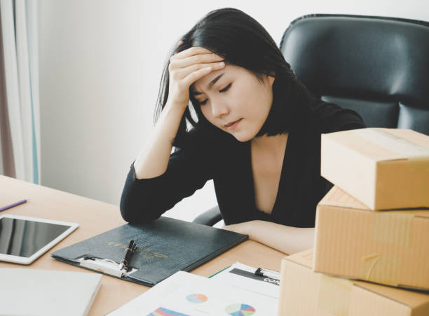 istock Female Office worker is exhausted with overworked 921225466