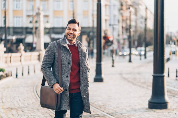 istock Businessman walking on the street 921225546