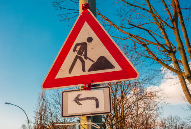 istock building site sign with small arrow in winter 921228212