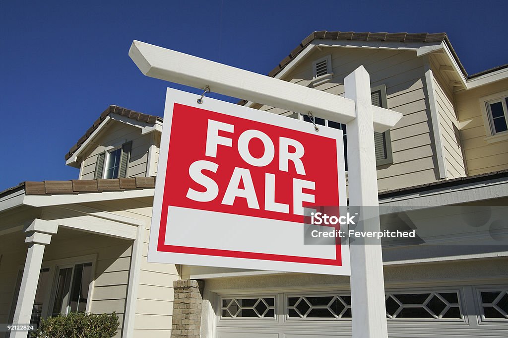 Home For Sale Sign in Front of New House  Beginnings Stock Photo