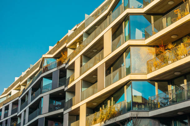 istock futuristic apartment facade with big panoramic windows and steel balcony 921230348