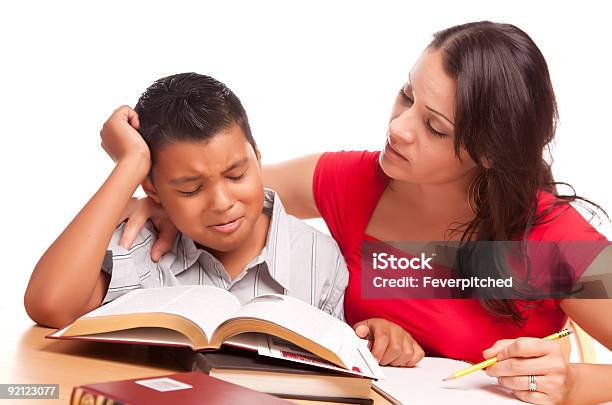 Frustrated Hispanic Son And Mother Study Stock Photo - Download Image Now - Struggle, Homework, Student