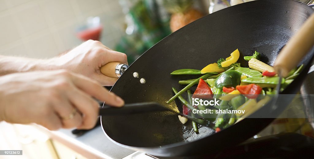 Chef cooking  Wok Stock Photo