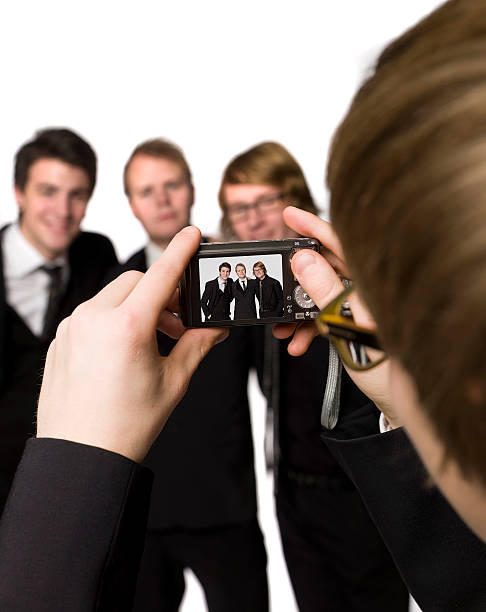 istock Taking a picture of three men 92124316