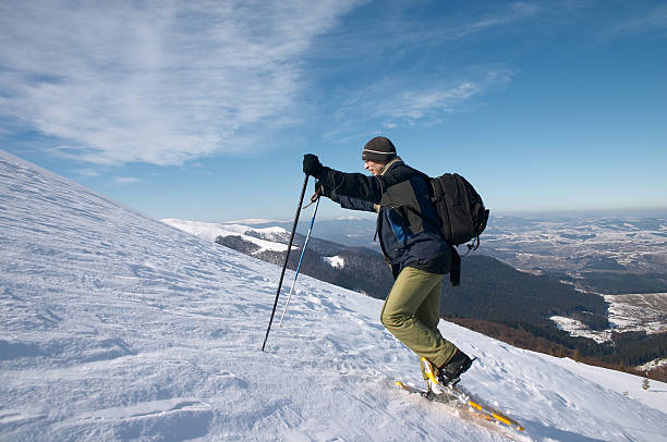 istock men in snow shoes 92125016