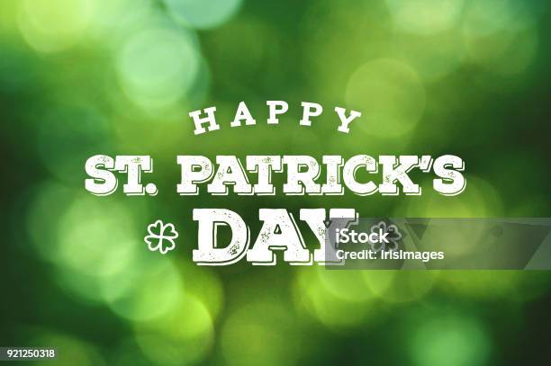 Happy St Patricks Day Text Over Green Bokeh Lights Stock Photo - Download Image Now
