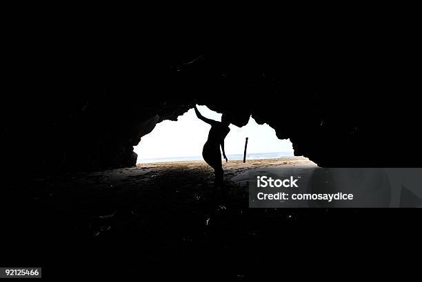 Explorar Cave Foto de stock y más banco de imágenes de Cueva - Cueva, Kauai, Chica pin-up