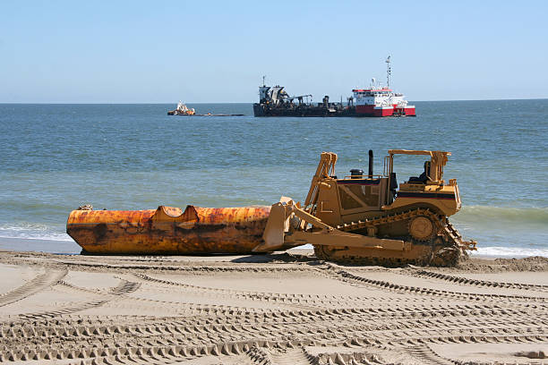istock Beach Replenishment Pushing the Tube 92125612