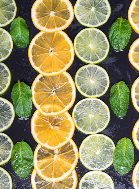 istock Limes and lemons slices over dark slate 921257574